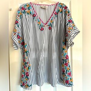 Black and white striped blouse with floral embroidery